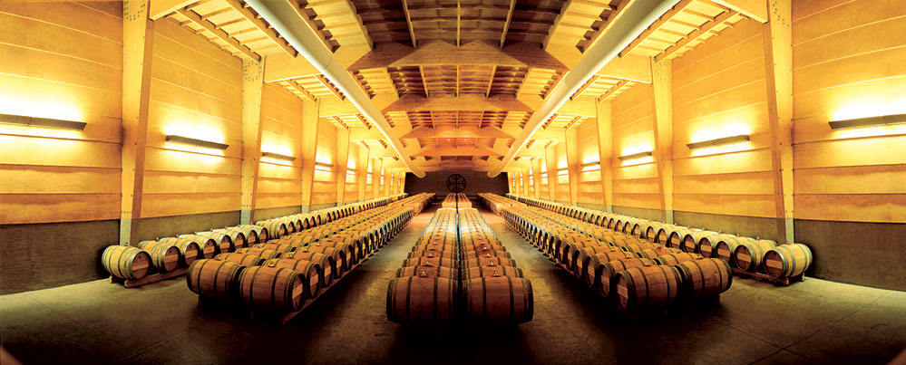 The architecture of Almaviva’s barrel room replicates the perspective of looking out to the vineyards
